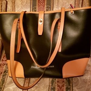 Authentic Dooney and Bourke Tote/ inside cloth is hot pink